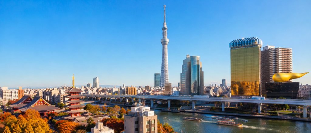 Panoramic view of Tokyo with Tokyo Skytree, Senso-ji Temple and Sumida River, showcasing one of the best places and where to live in Japan for foreigners.